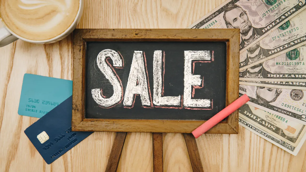 Sale sign flatlay.