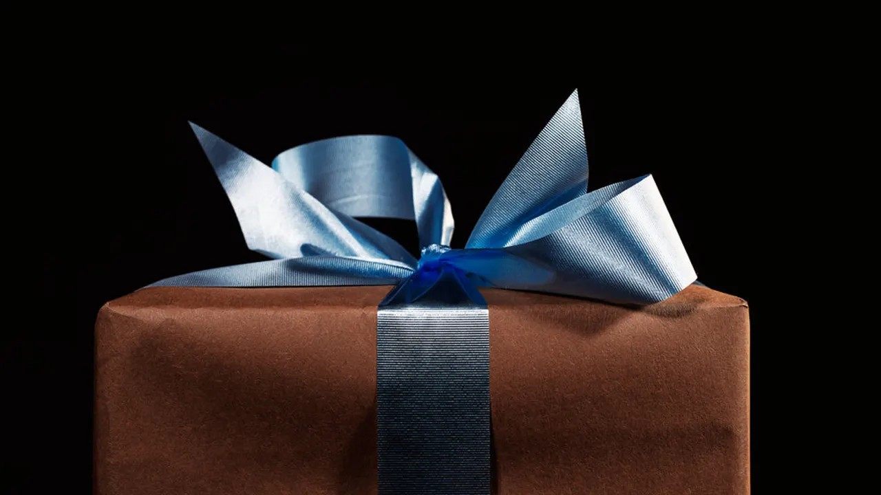 Gift wrapped with bow.