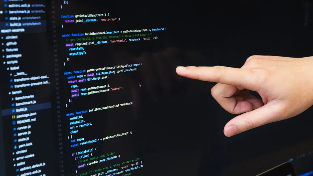 Finger pointing at javascript code.