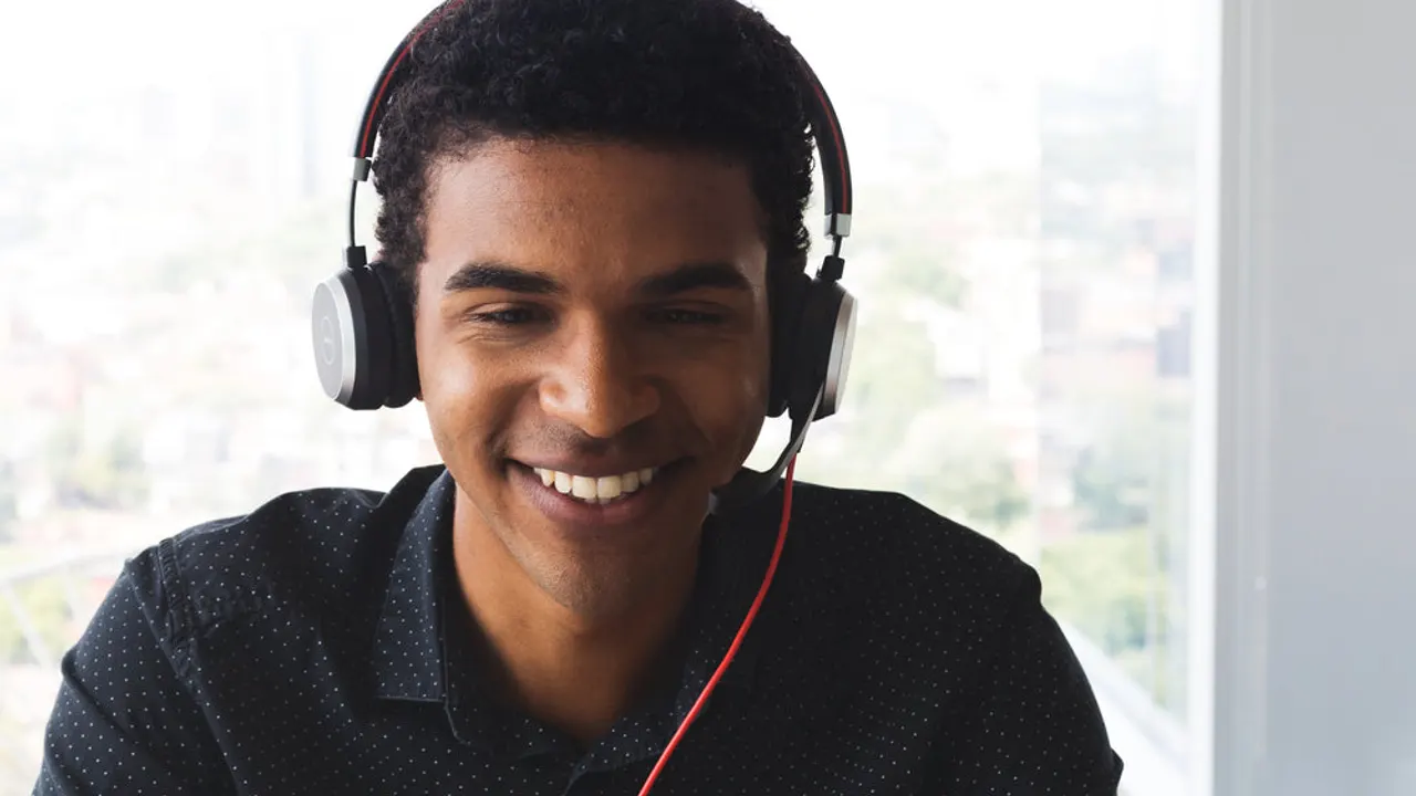 Customer support staff smiles.
